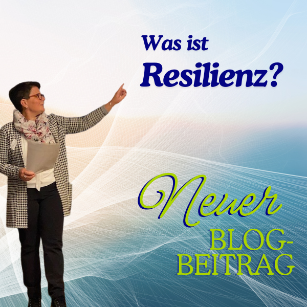 Eine Frau zeigt auf die Überschrift: Was ist Resilienz? Titelbild neuer Blogbeitrag